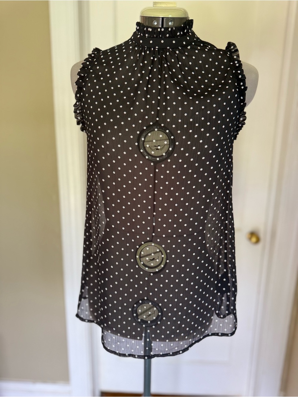 Sheer Sleeveless Black Polka Dot Mock Ruffle Neck Top